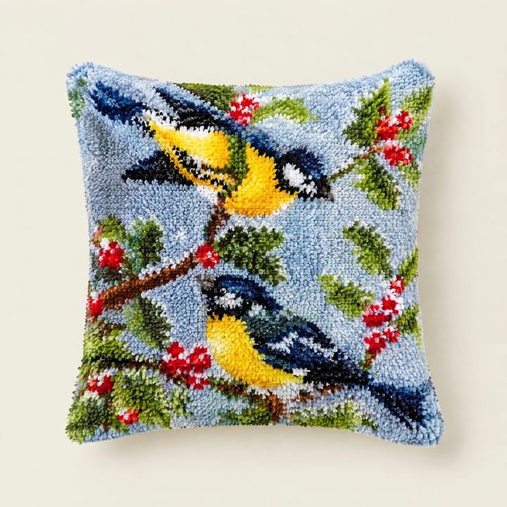 Sixteen animal latch hook pillows: kittens, horses, a fox, a giraffe, robins, owls and pandas