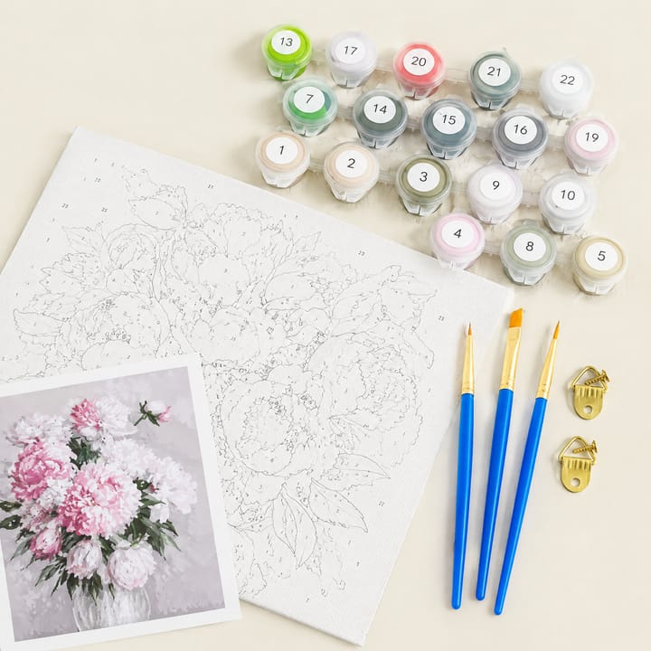 Open pots of acrylic paint from the kit