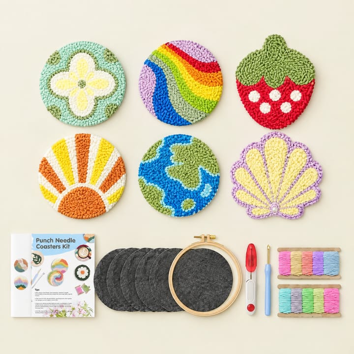 Rainbow and shell punch needle coasters with the kit