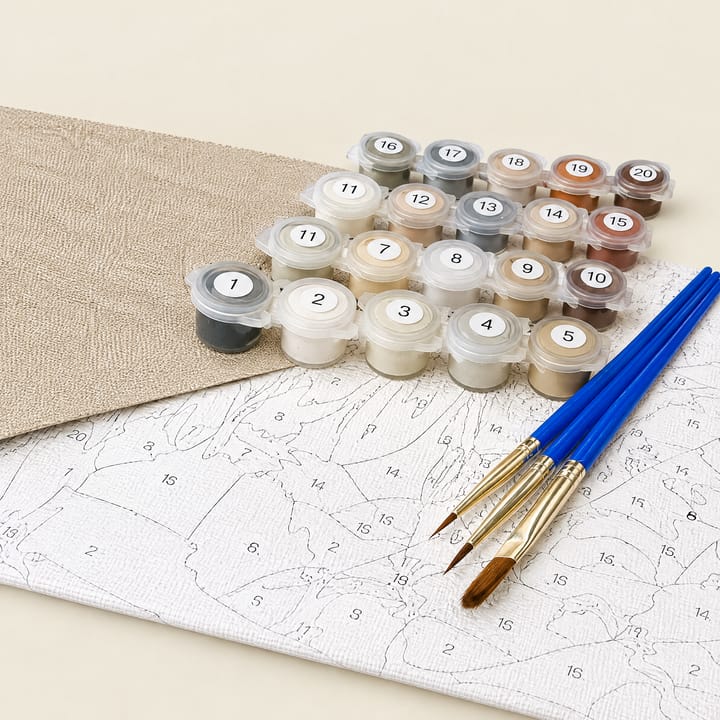 Numbered paint pots and brushes on the canvas