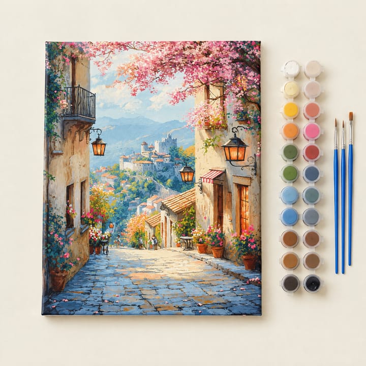 Lantern lane design: a cobbled lane with lanterns and a castle behind