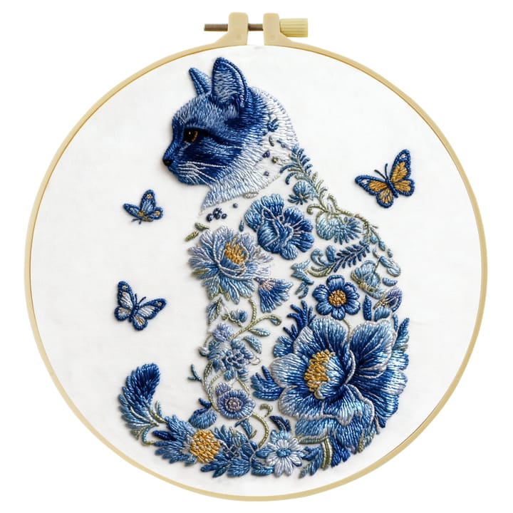Blue floral cat embroidery in an 8 in hoop on black